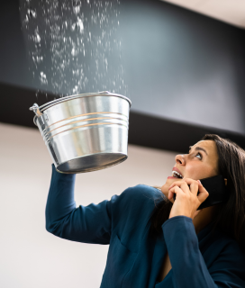 water flooding through ceiling 